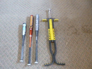 lot 85 image: Baseball Bats and Pogo Stick