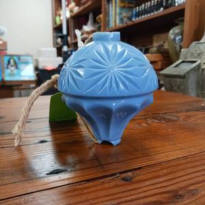 lot 31 image: Hawkeye Blue Milk Glass Lightning Rod Ball � Early 1900s � 5 x 4.5 inches