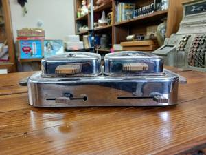 lot 48 image: Vintage Sears and Roebuck Electric Stainless Steel Waffle Iron � Wooden handles � heat control � about 15 inches by 9