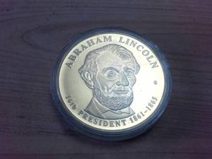 lot 67 image: Golden Abraham Lincoln Dollar � Made in USA