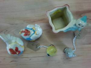 lot 77 image: Vintage figure lot � Pinocchio � little pig � plus chicken salt and pepper and square root starter