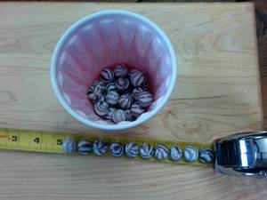 lot 145 image: Couple Dozen Vintage Glass Marbles  with Stripe Design