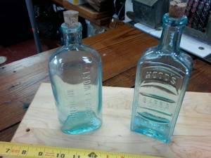 lot 193 image: Lydia E. Pinkham -  Hoods Sarsa Parilla Vintage Bottles in excellent condition