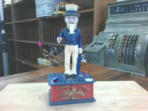 lot 209 image: Vintage Uncle Sam Plastic Piggy Bankd