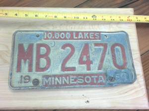 lot 224 image: Vintage 1963 Embossed 10000 Lakes Minnesota License Plate with metal tab