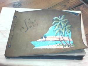 lot 269 image: Vintage Snap Shots Leather Bound Photo album with vintage pics and empty pages