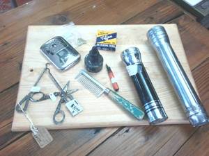 lot 270 image: Early 1900s magic scratch removers � vintage flash lights � vintage inkwell and stylus � stainless hand warmer � Tiffen retaining rings