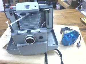 lot 355 image: Vintage Polaroid Land Camera with Case � Automatic 230 with flash attachment