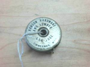 lot 371 image: Vintage Hanson Hardware and Lumber Tape Measure called Little Pal � 3 ft long Zimmerman, MN � all metal, miniature