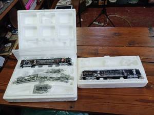 lot 401 image: Johnny Cash Bachman Hawthorne Village Train care set � brand new unopened track � cars are 12 inches long � have certificate of authenticity with unopened box