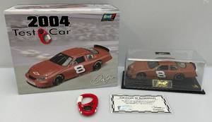 lot 54 image: 2004 Rivell Collection Limited 1 Of 3,570 124 Scale NASCAR Die Cast #8 Test Car With Stopwatch Dale Earnhardt Jr. In Original Box With Plastic Display Case (With COA)