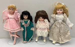 lot 120 image: Misc. Collectible Porcelain Dools On Stands In Protective Bags