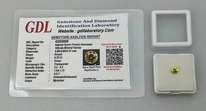 lot 131 image: GDL Gemstone And Diamond Identification Laboratory Natural Green Peridot .75CT Gemstone Round With Card