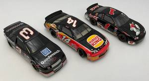 lot 226 image: Misc. Vinage Collectible NASCAR Die Cast 124 Scale Dale Earnhardt #3 Car, Dale Earnhardt Jr. #1 Coca-Cola & Steve Park #14 Buger King Car