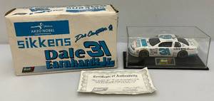 lot 236 image: Collectible RIVELL Collection 124 Scale Die Cast DALE EARNHARDT JR. Sikkens #31 Car In Original Box (Box In Bad Shape)