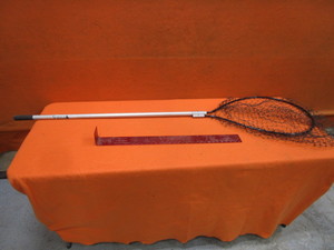 lot 105 image: Fishing Net & Measuring Stick