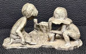 lot 47H image: Vintage Walli Ortman Pewter Sand Castle Boy and Girl Playing in the Sand