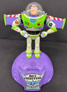 lot 105RO image: Buzz Lightyear 11-Inch Figure on Coin Bank Moon Base by Thinkway Toys