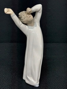 lot 69 image: Lladr Boy Yawning Porcelain Figurine - Hand Made In Spain  Lladr Boy Awaking Porcelain Figurine 4870