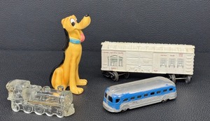lot 97CA image: Vintage Treasures including Lionel Savings Bank Boxcar 6050, Vintate Ceramic Pluto Figurine and More