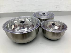lot 68 image: Set of Three Stainless Steel Mixing Bowls with Lids and Grater