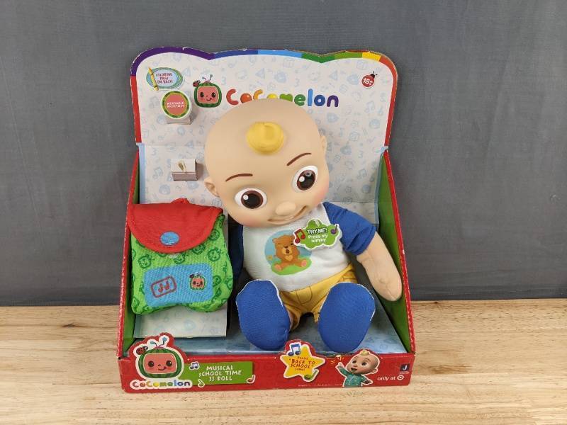 lot 200A image: CoComelon JJ Doll Musical School Time - Brand New A