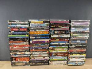 lot 124F image: 124 DVD Movies The Italian Job, Nutty Professor, Wedding Planner, Pirates of the Caribbean C