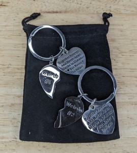 lot 293 image: 2 Key Chains Weirdo #1 & Weirdo #2 - Together Forever And Never Apart