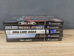 lot 146F image: 5 Nintendo GameCube Games - Star Wars Rebel Strike Rogue Squadron II, Big Air Freestyle, Super Smash Bros. Melee, NBA Live 2003, and Luigis Mansion C