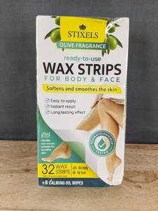 lot 556 image: 64 Stixels Wax Strips Body & Face and 16 Calming Oil Wipes - Brand New
