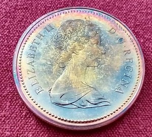 lot 4 image: Beautiful Rainbow Toned 1971 Canadian Silver Half Dollar