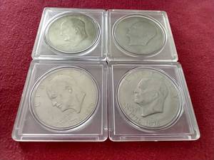 lot 21 image: (4) Eisenhower Dollars