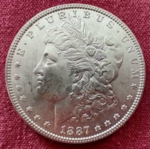 lot 36 image: Beautiful 1887 Morgan Dollar