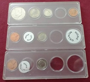 lot 52 image: Several Uncirculated 1969 Coins - Includes 40% Half Dollar