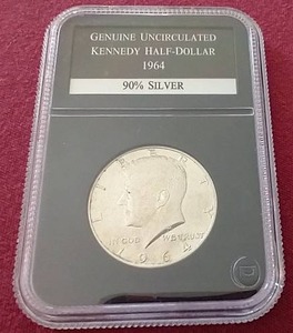 lot 86 image: Slabbed Uncirculated Kennedy Silver Half Dollar