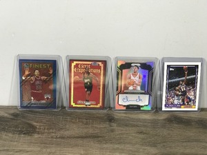 lot 205 image: Lot of 4 Collectible Basketball Cards - see description for more info