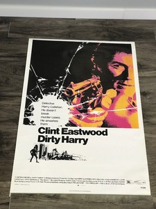 lot 253 image: Movie Poster - Clint Eastwood  Dirty Harry - Detective Harry Callahan He Doesnt Break Murder Cases. He Smashes Them