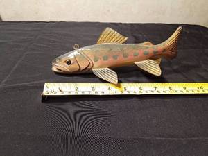 lot 29 image: Signed 2009 Hand carvedpainted wood Bass spearing fish decoy with metal fins by R. Whittier