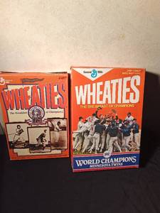 lot 26 image: 1987 World Champions Minnesota Twins Wheaties box and a 75th commemorative Negro leagues of Champion Wheaties box