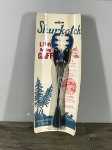 lot 254 image: Vintage Shurkatch Lion Spring Fishing Gaff in Original Package
