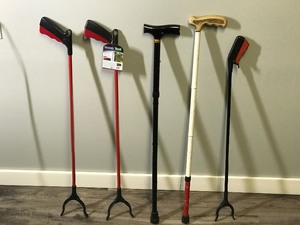 lot 318 image: 3 - Reach Tools and 2 Canes