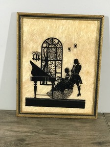 lot 331 image: Vintage Reverse Painted Milkweed Silhouette Art Framed - Lady Playing the Piano