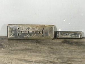 lot 388 image: M. Hohner Echo Bell Metal Reeds Harmonica & Toy Tunes Deluxe Jaru Harmonica