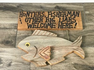 lot 391 image: Wood Wall Hanging Fishing Sign - Hunters, Fisherman & Other Big Liars Welcome Here