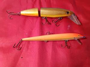 lot 78 image: 1 Depth Raider Butchertail Jointed body Musky fishing lure and a large Rapala fishing lure
