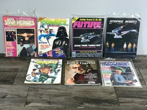 lot 186 image: Lot of Collectible Magazines - MAD - Rolling Stone Jerry Garcia - Super Star Heroes Star Trek - Comics Scene (Batman & Return of the Jedi) - Future Life Star Trek - Enterprise Incidents Star Trek - Video Gaming Star Trek