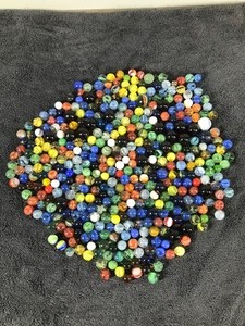 lot 181 image: Lot of Collectible Marbles &nbsp- Some of them glow green when you put a black light on them