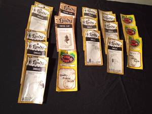 lot 148 image: New in package night crawlerleech fishing snells, minnow fishing snells and swivel clips