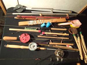 lot 149 image: Bucket of vintage ice fishing sticks, reels and more