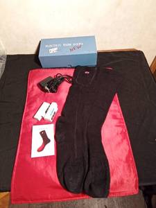 lot 162 image: Electric rechargeable heated socks with charger and batteries